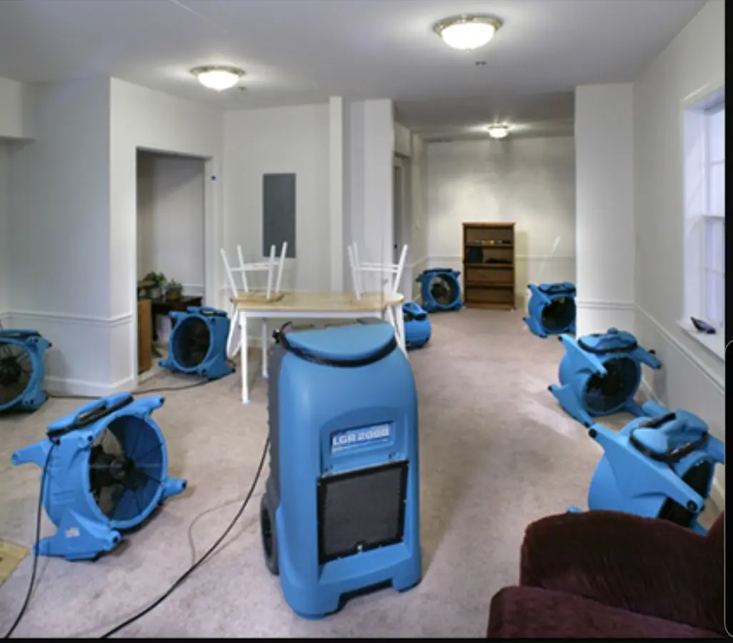 Air movers and dehumidifier setup for Water Damage Restoration in Marlene Village